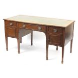 Edwardian mahogany pedestal writing desk with green tooled leather insert above three drawers and