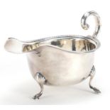 Silver sauce boat raised on three hoof feet, Birmingham, 1932, 15cm in length, 99.2g :For Further