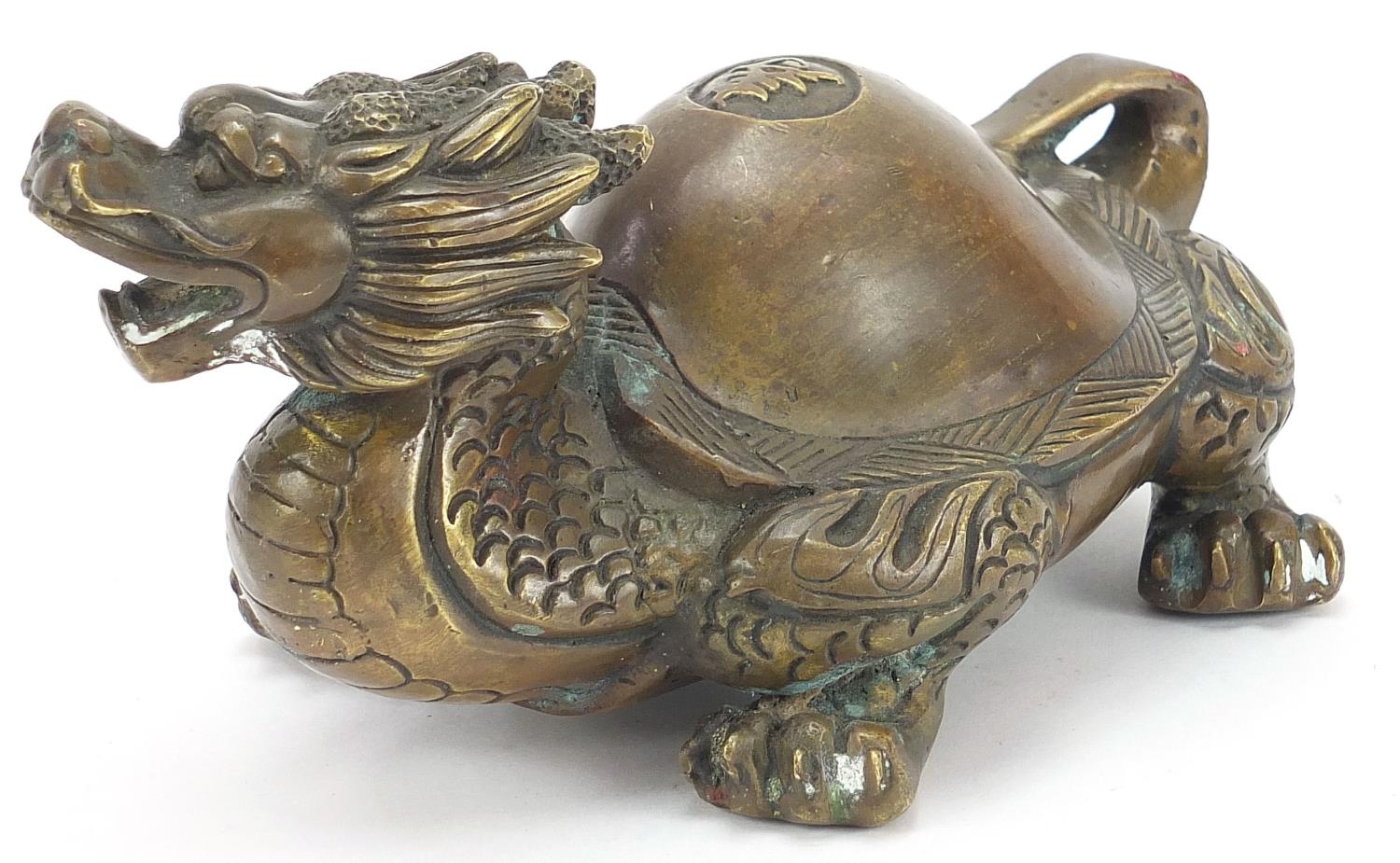 Chinese patinated bronze mythical animal, 21cm in length :For Further Condition Reports Please Visit