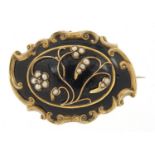 Antique unmarked gold and black enamel mourning brooch set with seed pearls and a diamond, (tests as