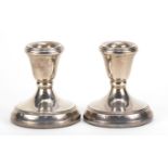 L J Millington, pair of Elizabeth II silver dwarf candlesticks, Birmingham 1992, 7.5cm high, 203.