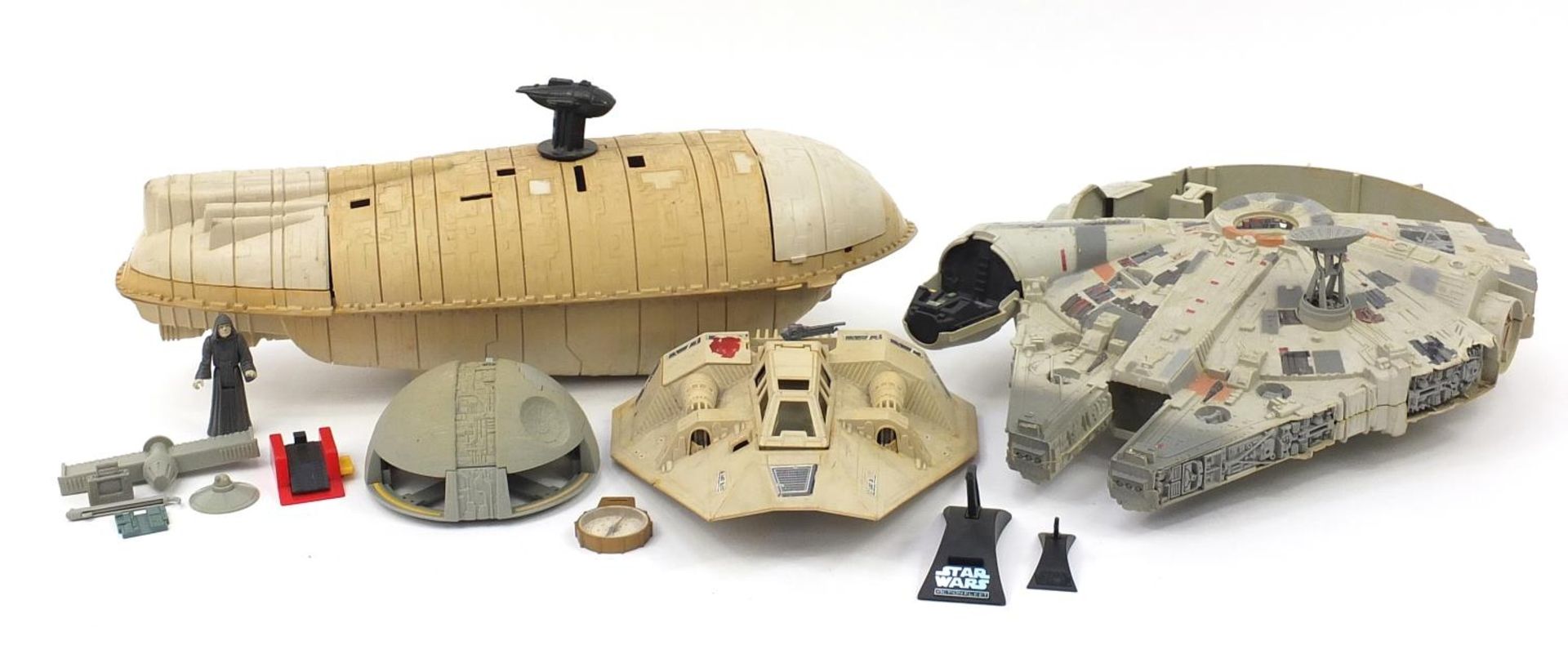 Vintage Star Wars toys including a Millennium Falcon and a Rebel Transport :For Further Condition