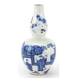 Chinese blue and white porcelain double gourd vase hand painted with figures in a palace setting,