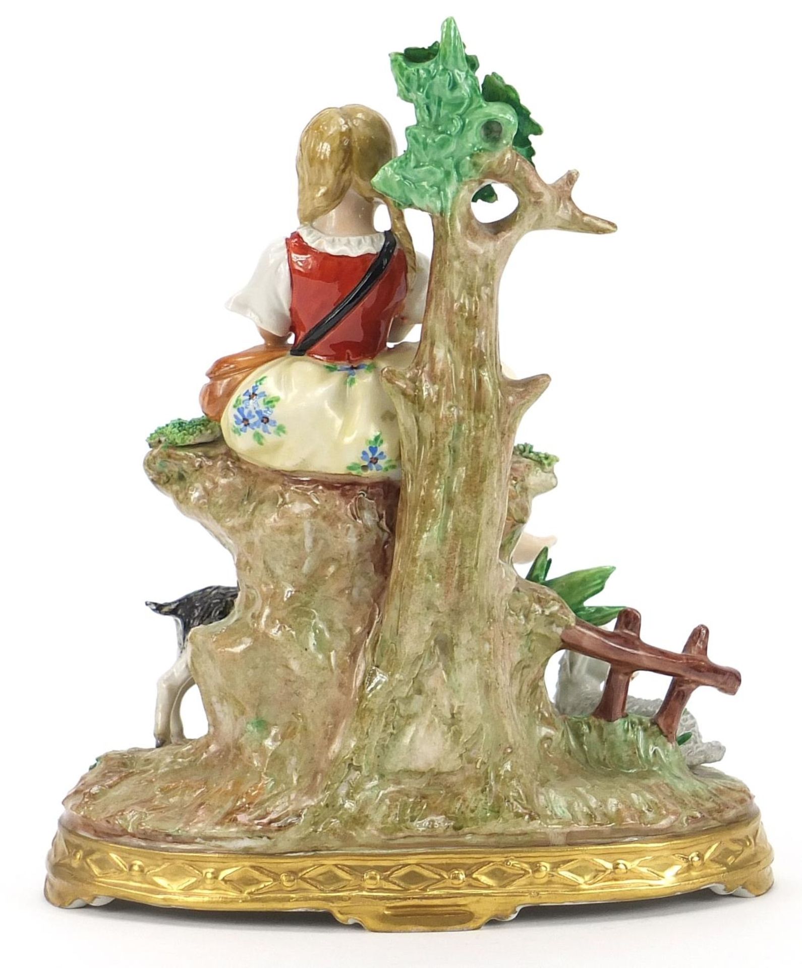 German porcelain figurine of a female playing a flute with a kid and two lambs, 19.5cm high :For - Image 2 of 4