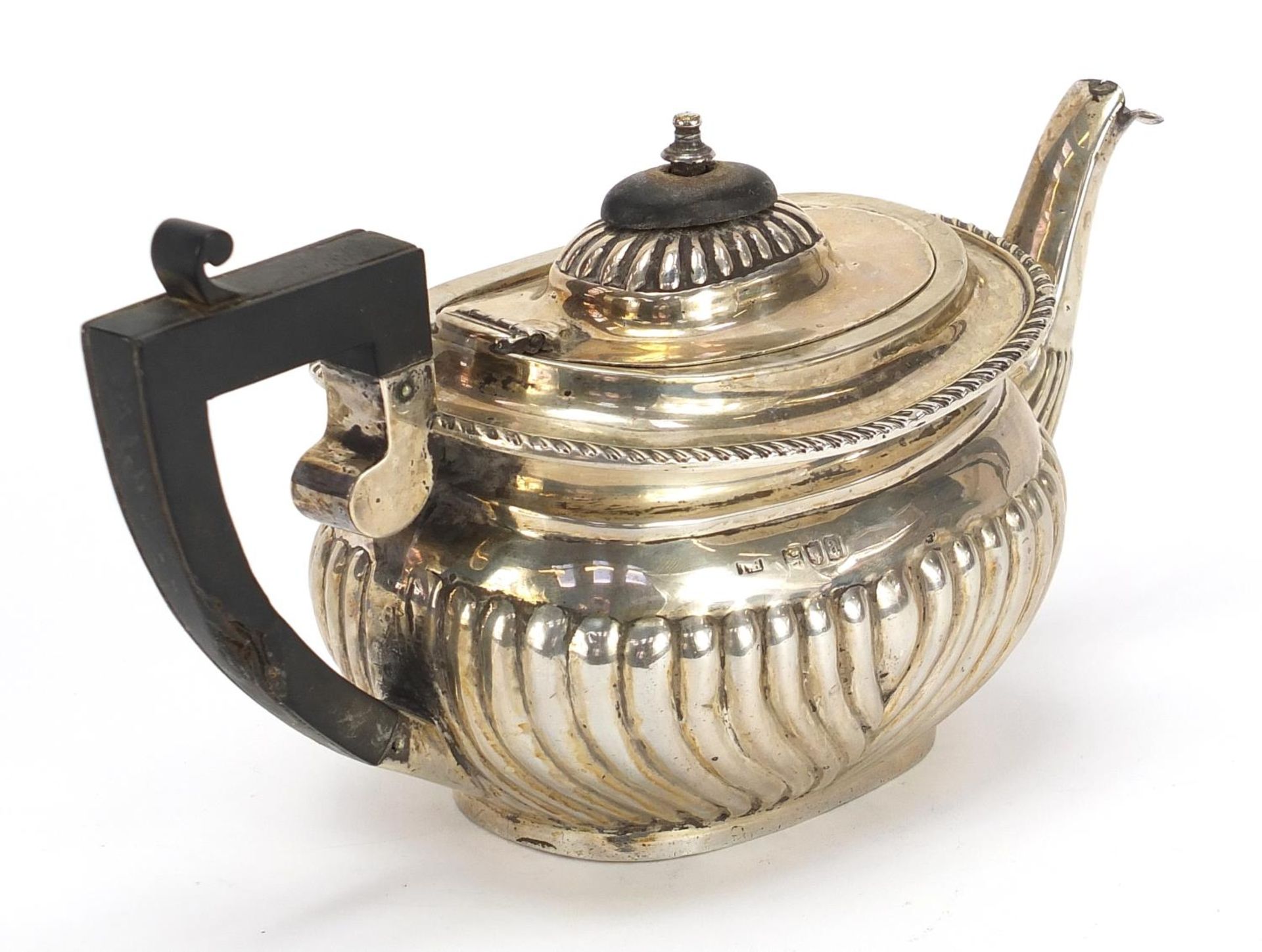 Thomas Hayes, Victorian silver teapot with demi fluted body and ebonised handle and knop, London - Image 2 of 4