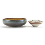 Johnathan Chiswell Jones, two studio pottery lustre bowls hand painted with stylised flowers,