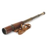 Broadhurst, Clarkson & Co, three draw leather bound brass telescope, 26cm in length when closed :For