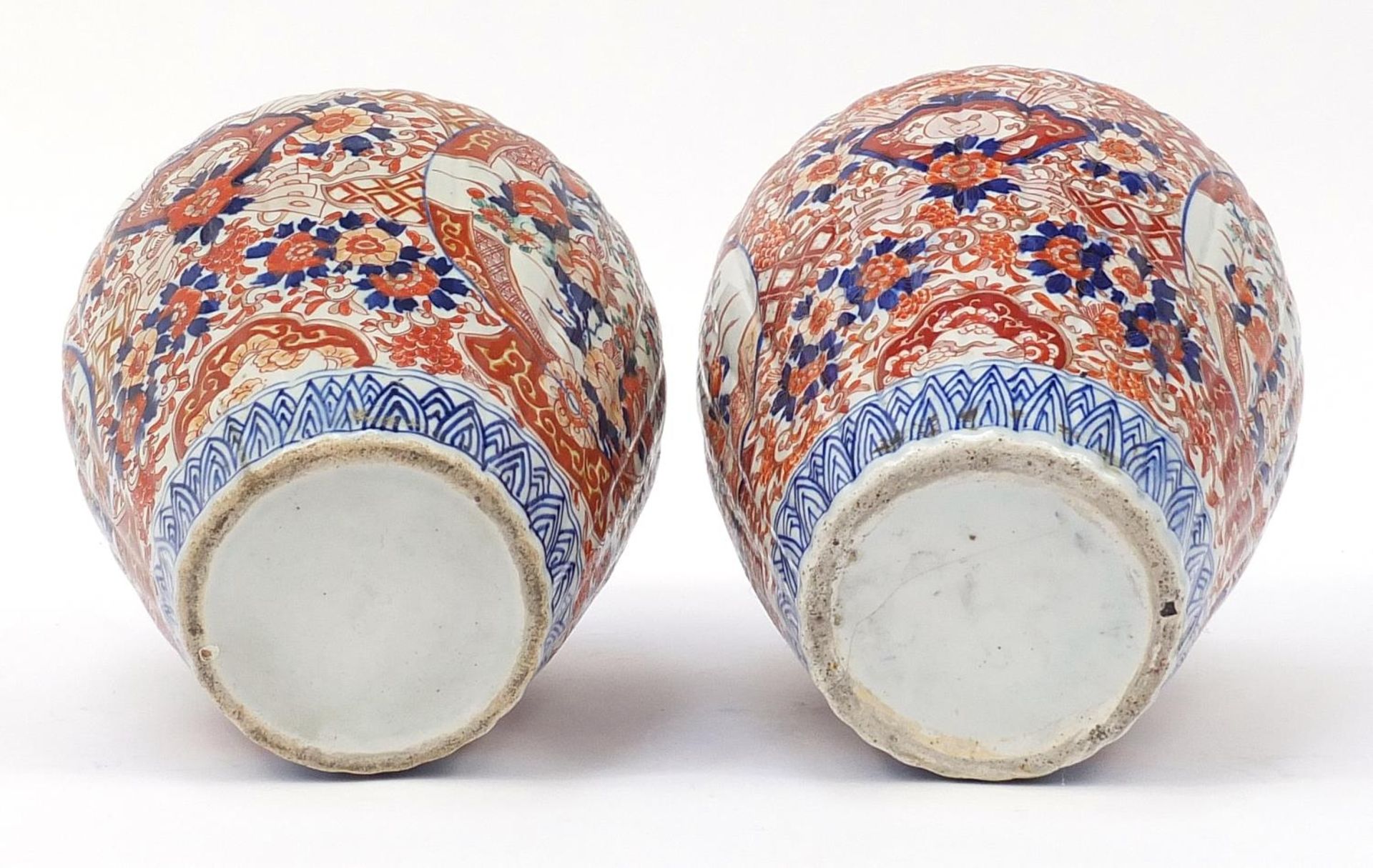 Large pair of Japanese Imari lidded porcelain vases, each profusely hand painted with flowers, - Image 8 of 9