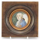 French circular hand painted portrait miniature of Louis XVI, mounted and framed, the miniature