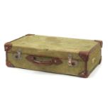 Vintage canvas and leather bound suitcase with British Railways paper label, 66cm wide :For