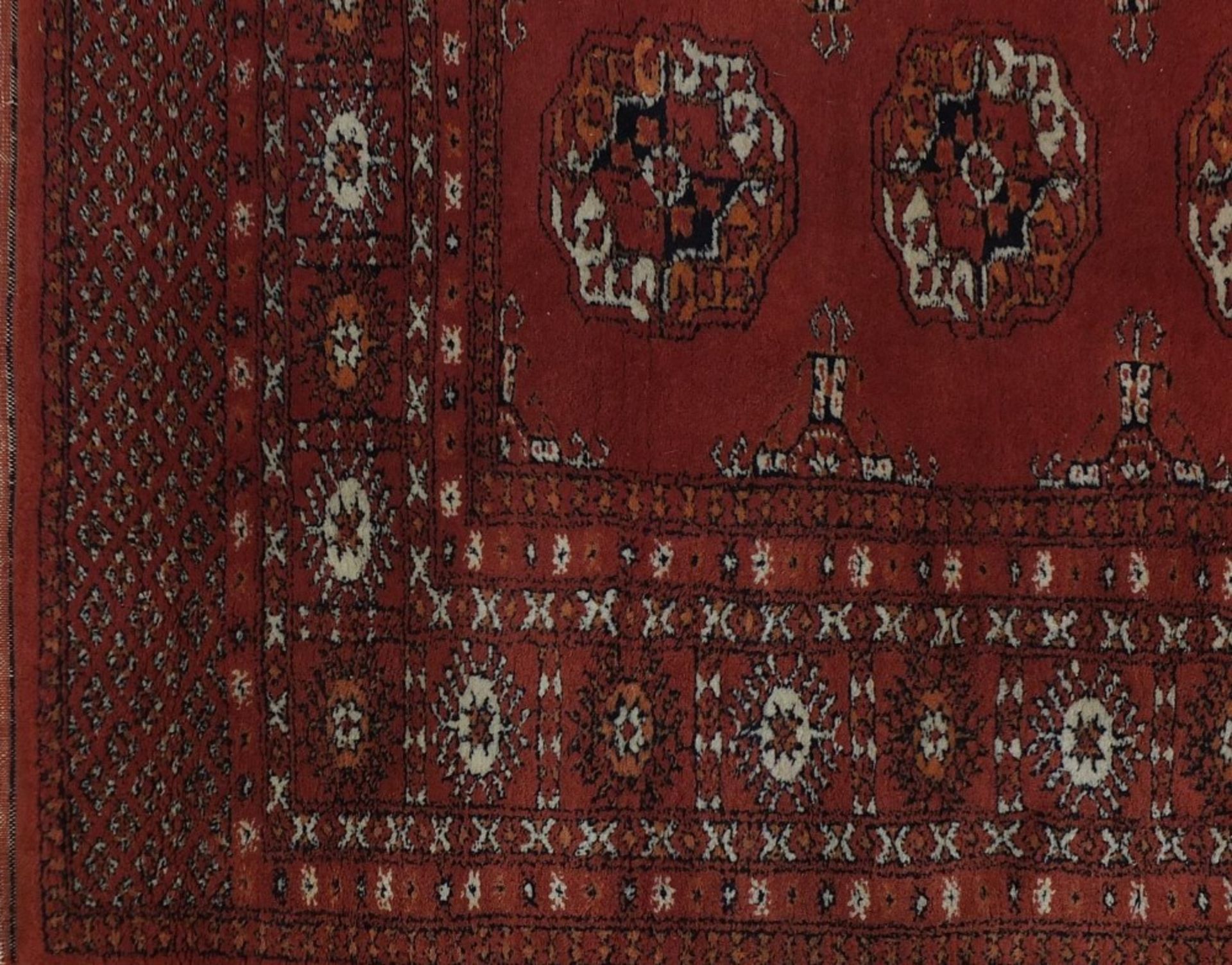 Rectangular Persian rug having a traditional repeat medallion, 200cm x 125cm :For Further - Image 3 of 4
