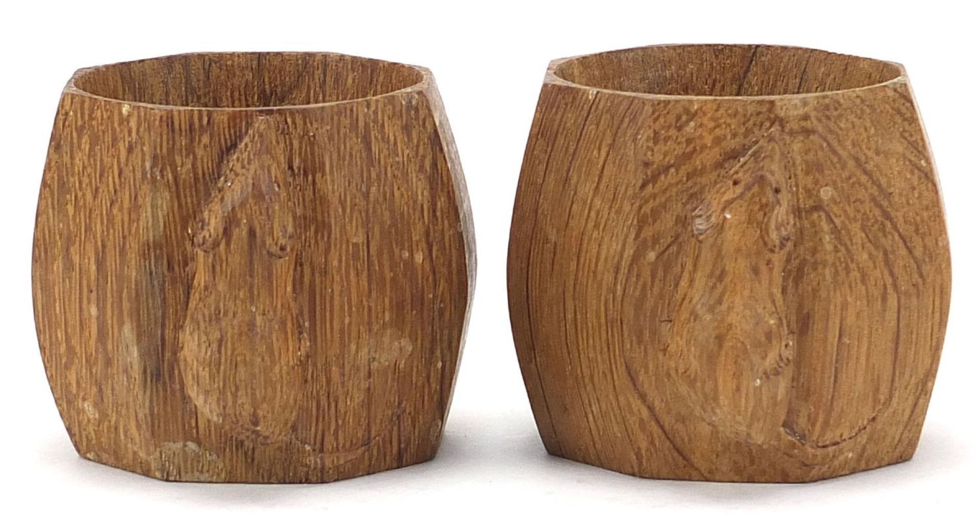 Robert Mouseman Thompson, pair of carved oak napkin rings, each 5cm high :For Further Condition