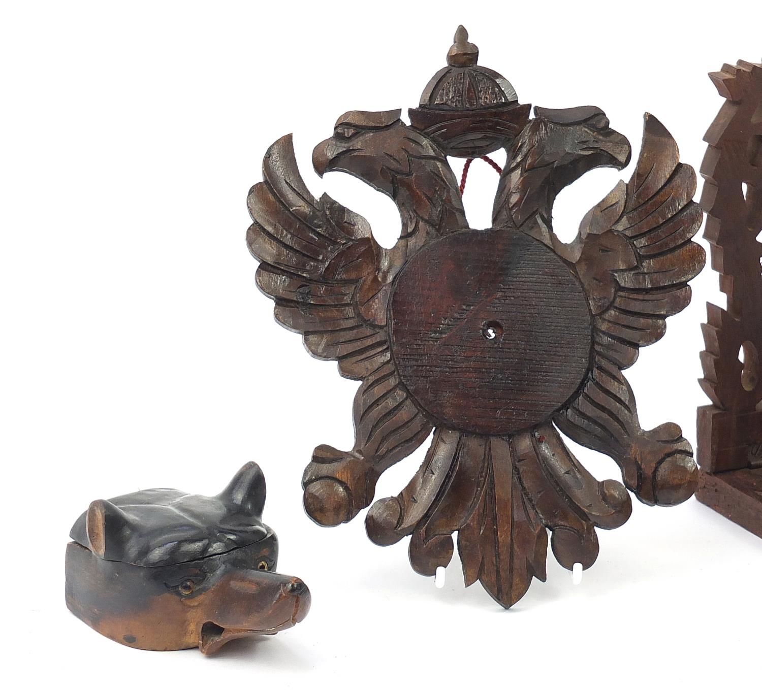 Black forest wood carvings including a dog's head inkwell with ceramic liner and an extending book - Image 2 of 8