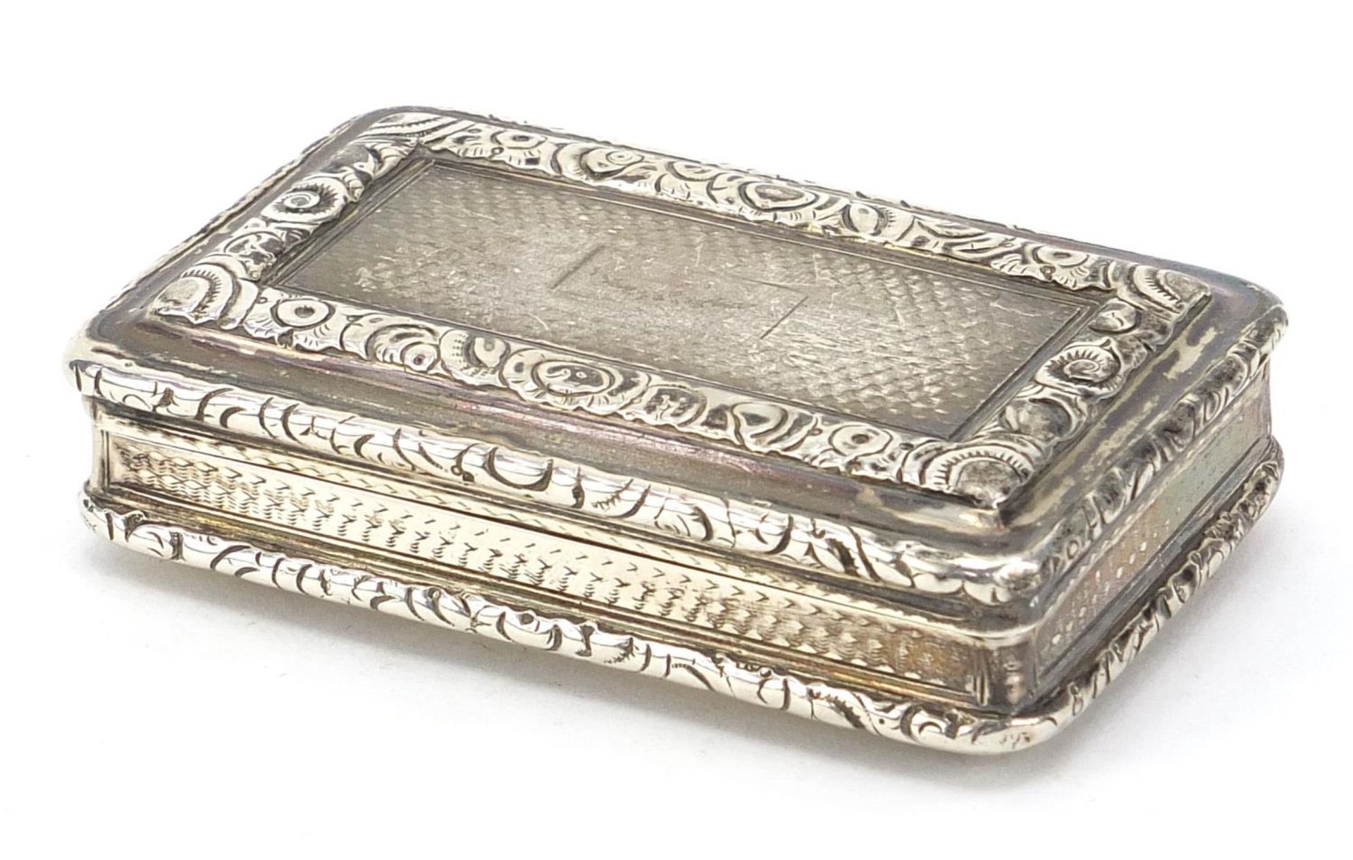 Joseph Willmore, George IV silver snuff box with hinged lid, engine turned decoration and gilt