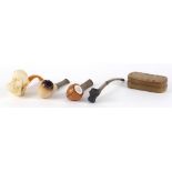 Smoking objects including an antique horn snuff box and a Meerschaum pipe with amber coloured
