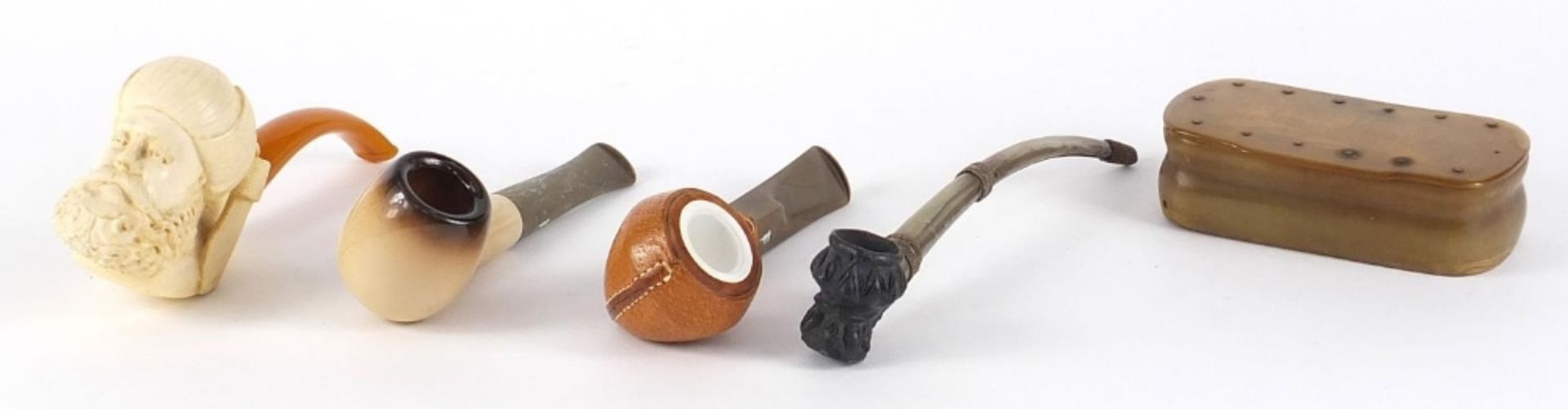 Smoking objects including an antique horn snuff box and a Meerschaum pipe with amber coloured