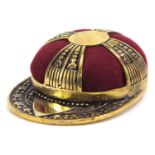 Novelty brass pin cushion in the form of a jockey's cap, 5cm in length :For Further Condition