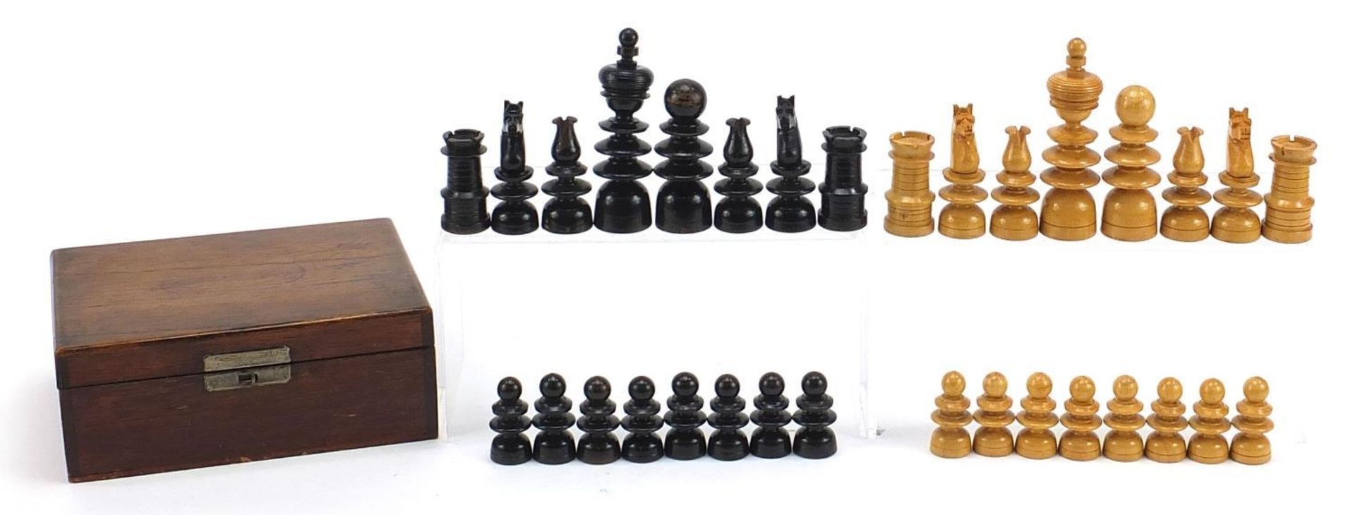 Box with ebonised Chessman chess set with case, the largest pieces each 10cm high :For Further