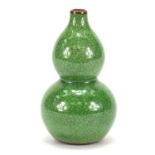Chinese porcelain crackle glazed double gourd vase having a green monochrome glaze, 15cm high :For