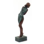 Large Mid century design patinated bronze figure of a female raised on a plinth base, 64cm high :For