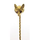 9ct gold fox head stick pin with pink stone eyes, 5.5cm in length, 2.8g :For Further Condition