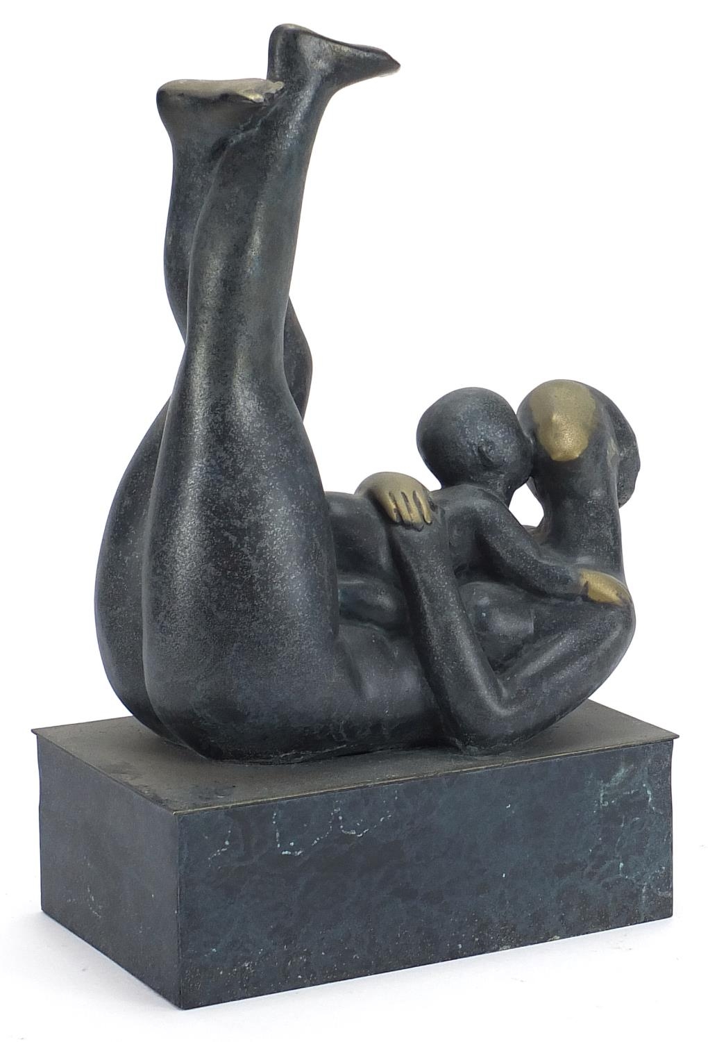 Mid centuruy design patinated bronze sculpture of a mother and child, 33cm high :For Further