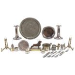 Metalware including a pair of silver napkin rings and pair of silver plated candlesticks, the