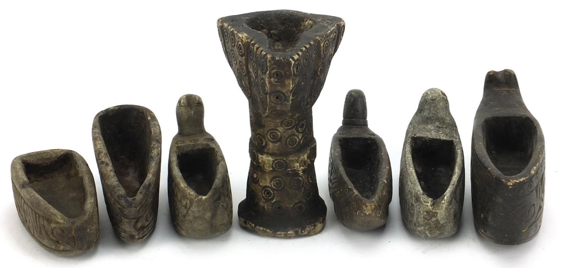 Seven Islamic carved stone oil lamsp including four in the form of birds, 14cm high :For Further - Image 4 of 5