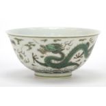Chinese porcelain bowl finely hand painted in green with two dragons chasing a flaming pearl above