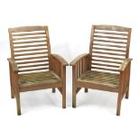 Pair of teak slatted garden chairs, each 87cm high :For Further Condition Reports Please Visit Our