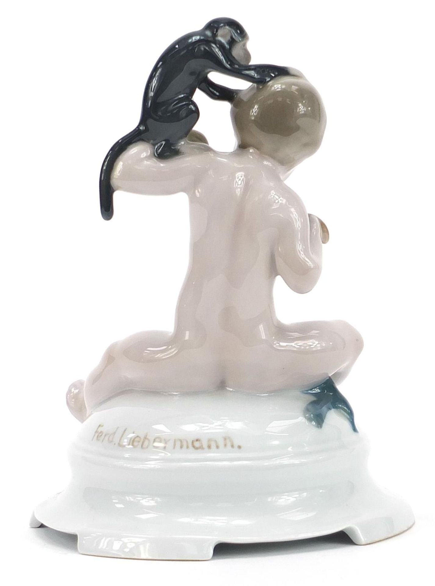 Ferdinand Liebermann for Rosenthal, porcelain figure of a young boy feeding a monkey, 17cm high :For - Image 2 of 5