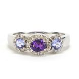 14ct white gold tanzanite, amethyst and diamond trilogy ring, size O, 4.0g :For Further Condition