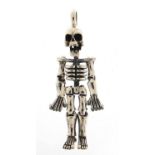 Novelty silver human skeleton pendant with articulated limbs, 5.5cm high, 15.8g :For Further