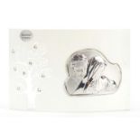 Italian curved glass plaque with a silver mount embossed with Madonna and child, 16.5cm wide :For