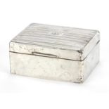 William Neale, George V rectangular silver cigarette box, the hinged lid with engine turned