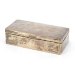 Rectangular silver cigar box with hinged lid, indistinct hallmarks, 5cm H x 18.5cm W x 9cm D, 518.2g