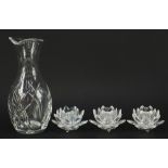 Glassware comprising a Waterford John Rocha water carafe and three Swarovski Crystal candle holders,