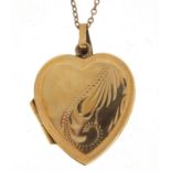 9ct gold love heart locket on a 9ct gold necklace, 2.5cm high and 48cm in length, total 3.7g :For