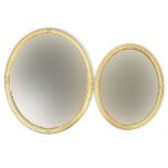 Two oval gilt framed wall mirrors with bevelled glass, the largest 65cm x 56.5cm :For Further