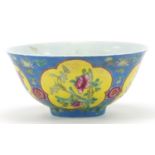 Chinese porcelain blue ground bowl hand painted in the famille rose palette with flowers, four