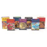 Seven Harry Potter books including paperback Philosopher's Stone, first edition Deathly Hallows,