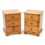 Pair of pine three drawer bedside chests, each 59cm H x 44cm W x 38.5cm D :For Further Condition