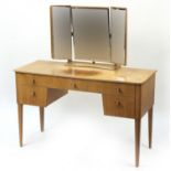 Heals, Art Deco limed walnut dressing table with triple aspect mirror and five drawers, 133cm H x 1
