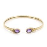 9ct gold amethyst bangle, 5.5cm in diameter, 6.4g :For Further Condition Reports Please Visit Our