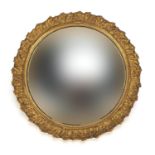 Circular gilt framed convex wall mirror, 31cm in diameter :For Further Condition Reports Please