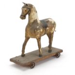 Antique wooden pull along horse, 32.5cm in length :For Further Condition Reports Please Visit Our