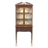Chinese Chippendale design mahogany display cabinet on stand with astral glazed doors enclosing