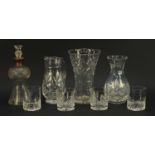 Cut glassware comprising a silver mounted decanter, two vases, jug and a pair of Edinburgh crystal