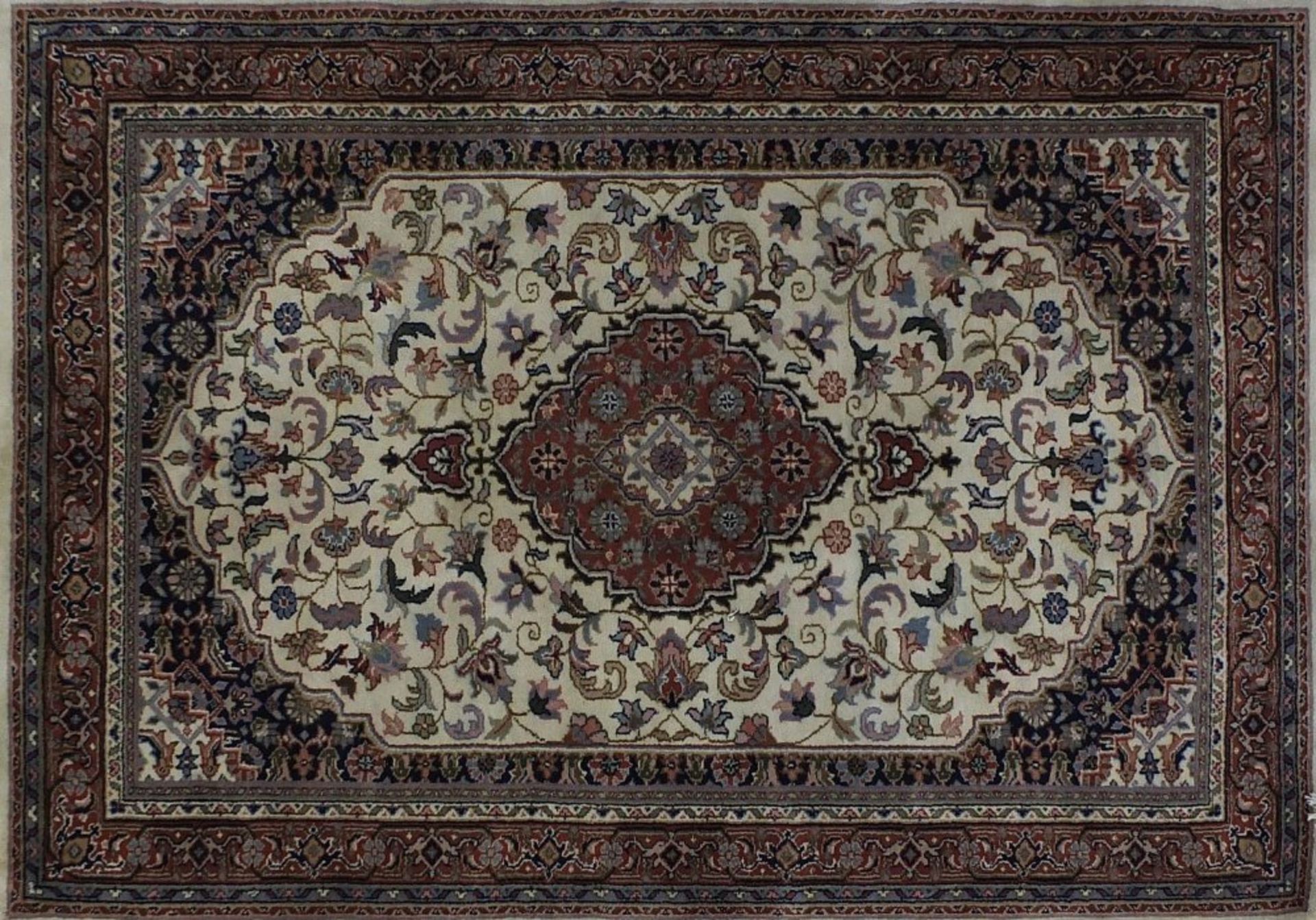 Rectangular Persian rug having all over floral design and central medallion, 183cm x 126cm :For