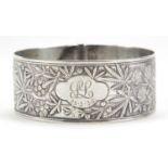 Edwardian aesthetic silver belt buckle bracelet embossed with flowers and foliage, 6cm in
